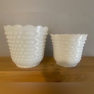 A pair of white milk glass hobnail vases by Fire-King.